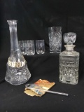 Grouping of Glass Drinking and Liquor Vessels including decanter with bourbon tag