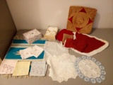 small vintage cloth items including embroidery and handmade items