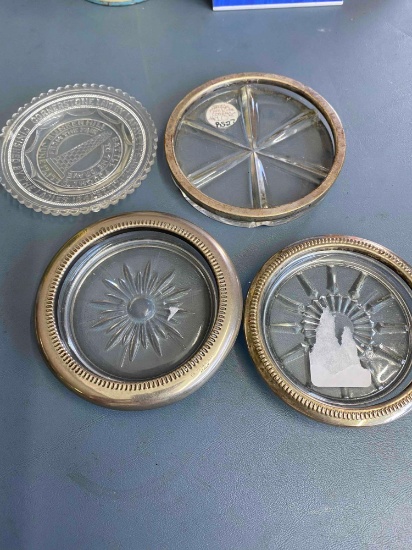 3 silver rimmed coasters including one Sterling and pairpoint plate