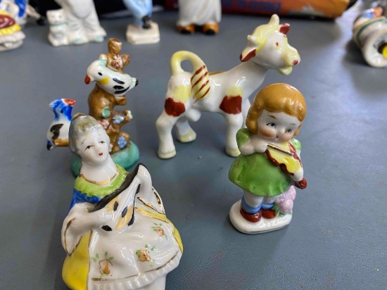 4 authentic occupied Japan figurines including Cow and Birds