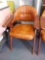 (1 of 2) BROWN LEATHER AND WOOD ARMCHAIR