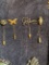 4 goldtone stick pins