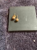 Pair of 14k gold stud earrings