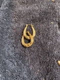 Pair of 14k gold ornate horseshoe shaped earrings