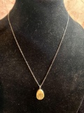 Sterling Silver chain with pretty carved wood or bone pendant