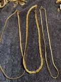 3 realistic looking Gold tone necklaces