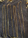 4 realistic looking Gold tone necklaces