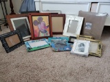 Large array of picture frames including MICKEY MOUSE, new photo book and much more