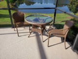 Patio glass top table and 2 chairs