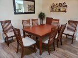 Large Cinnamon Wood dining table with leaf and 8 chairs