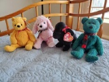 (4) TY beanie babies including Poopsie and pups