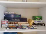 Game shelf grouping including SEALED 10,000 Pyramid