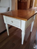 Wood and Cream end table with woven accent drawer