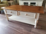 Wood and cream coffee table with woven drawer accent