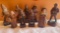 Lot of intricately carved small folk art figurines