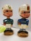 PAIR OF VINTAGE SPORTS SPECIALTIES NEW YORK JETS AND MIAMI DOLPHINS BOBBLEHEADS