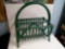 GREEN WICKER MOLDED MAGAZINE RACK