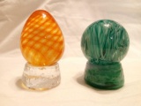PAIR OF GLASS PAPERWEIGHTS ON BASES