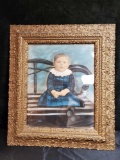 LARGE ORNATE FRAME WITH TINTED/EDITED ANTIQUE PHOTO OF CHILD