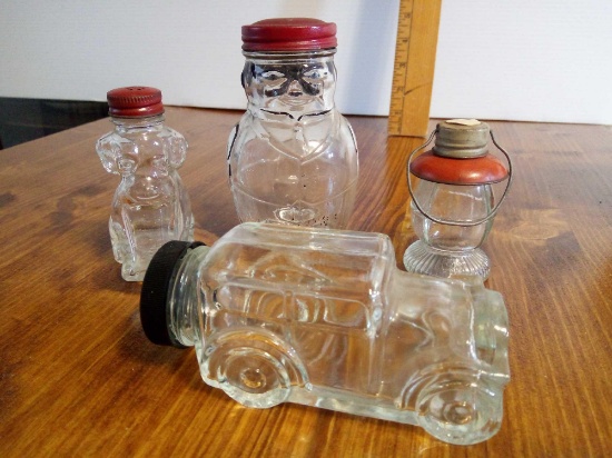 (4) CLEAR GLASS LIDDED VINTAGE CONTAINERS WITH LIDS