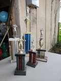 Vintage golf and boxing trophies