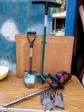four-piece garden grouping. task force trimmer, shovel, sod plugger