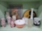 Shelf grouping including mid century swirl bowl, seaworld mug, clown bell, milk glass, speckled