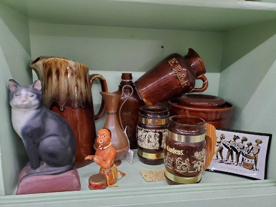 Vintage collectibles including Brown pottery, souvenir barrel mugs, Pfaltzgraff canister and more