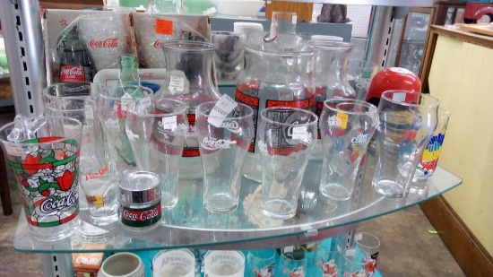 GREAT SHELF FULL OF COCA-COLA MERCHANDISE INCLUDING LARGE PITCHER AND GODFATHER'S PIZZA CARAFES,