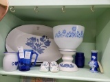 Blue and white shelf grouping including Pfaltzgraff, federal glass mixing bowl, cobalt and ceramic