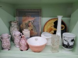 Shelf grouping including mid century swirl bowl, seaworld mug, clown bell, milk glass, speckled