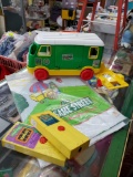 Sesame Street lot including Camper, fisher price movies and Elmo playmat