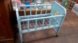 VINTAGE AMSCO BABY BLUE METAL BABY DOLL CRIB ON CASTERS, DROP SIDE, LAMBS