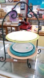 Nice wrought metal rack with 6 assorted Fiesta DINNERWARE plates