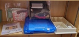 shelf grouping including scrapbook case of Baby Girl Album items, Kit,, wooden partitioned tray,