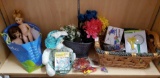 Shelf grouping including metal and woven decor baskets, cute bunny/basket, Dolls and toys