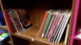 SHELF OF CRAFTING AND COOKING BOOKS AND MAGAZINES