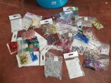 Bins of pins, stamps, embellishments