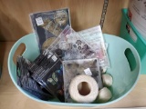 Bin of new packaged iron on patches, DIES, rubber stamps