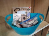 Bin of rubber crafting stamps, new and used, including the alphabet