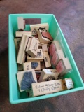 Bin of rubber crafting stamps, new and used