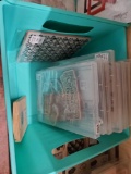 Bin of rubber and Clear stamps in boxes