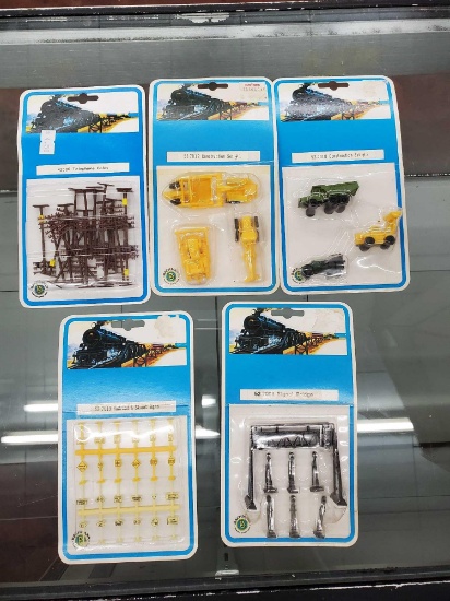 Model Railroad pieces NEW IN PACKS including signs, bridge,poles, construction sets