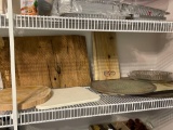 SHELF OF CUTTING BOARDS, PLACEMATS, CEDAR PLANKS