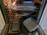 Baking Pans and cookie sheets contents of Oven
