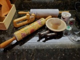 Kitchen supplies including Pie rollers, Wustof Trident knife sharpener, wooden mortar and pestle