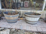 Pair of BOURBON BARREL PLANTERS with contents
