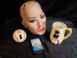 QUIRKY GROUPING INCLUDING CERAMIC HEAD, SEEN BETTER DAYS, BOTTOMS UP mug, CUTTY SARK PIN UP CARDS