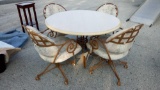 Wrought Iron Kitchen / Patio Table, Swirled Legs, with four chairs on casters