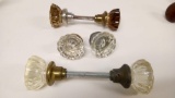 THREE SETS OF GLASS DOOR KNOBS, AMBER, CLEAR